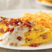Country Music Star Omelette · House-made sausage, diced ham, and onions, topped with cheddar and Monterey Jack cheeses, co...