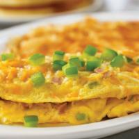 Denver Omelette · Diced ham, fresh green peppers and onions, topped with melted cheese.