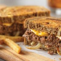 Patty Melt · Sautéed onions, American and Swiss cheeses on grilled marbled rye bread.