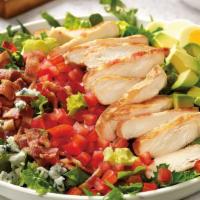Classy Cobb Salad · Grilled chicken breast, bacon, avocado, hard-boiled egg, tomato, and crumbled bleu cheese on...