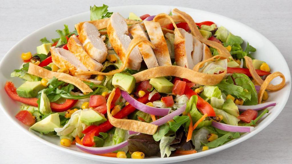 Southwest Salad · Grilled chicken breast, Southwest veggies, corn, avocado, tomatoes, and tortilla strips on mixed greens with Mexicali ranch dressing.