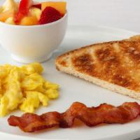 Junior Breakfast · One fresh egg, any style, choice of one strip of cherrywood bacon or sausage link and toast ...