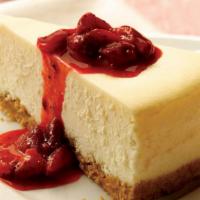 Cheesecake Slice · A rich and creamy New York-style cheesecake baked inside a honey-graham crust.