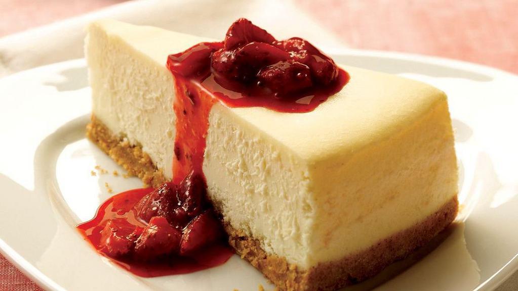 Cheesecake Slice · A rich and creamy New York-style cheesecake baked inside a honey-graham crust.