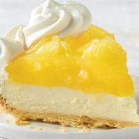 Lemon Supreme Pie Slice · Tangy lemon filling over cool, creamy supreme filling inside our flaky, golden pie crust, th...