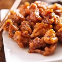 Orange Chicken Bowl · Stir fried and glazed in our secret orange sauce, this dish is served with a side of white r...