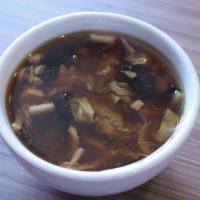 Hot & Sour Soup · Spicy. Rich and tangy broth, silken tofu, chicken, bamboo shoots, egg.