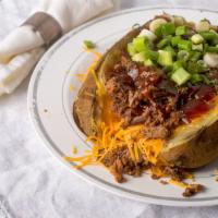 Meat (1) Loaded Potato · Loaded Potato comes with butter, cheese, sour cream, your choice of meat and topped with bar...