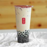 Pearl Milk Tea · Add toppings for an additional charge.
