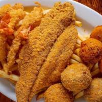 La Sampler · (3) Fried shrimp, (1) fried fish, (3) boudin balls & (3) hush puppies with choice of side