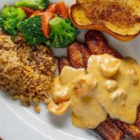Fish Bienville · Blackened fish topped with shrimp & crawfish in a cream sauce with choice of two sides