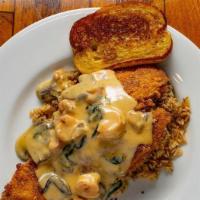 Flounder Orleans · Pecan crusted flounder topped with shrimp, crawfish, spinach and mushrooms in a homemade cre...