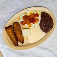 Huevos Rancheros · Huevos rancheros     
Home made tomato sauce over 2 eggs                                    ...