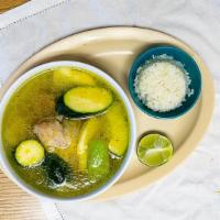 Caldo De Pollo · Chicken soup, rice and tortillas
