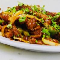 Chili Chicken · A popular indo chinese chicken dish, made with fried green chilies, green and red peppers, o...