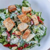 Caesar · Romaine lettuce and sun-dried tomatoes with our house made caesar dressing. Topped with parm...