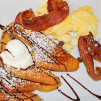 French Toast Special · 2 eggs, hickory smoked bacon, or link or patty sausages and 2 slices of brioche French toast...