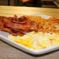 Bacon Lovers Breakfast (4 Slices) · 4 Slicks of our thick cut hickory smoked bacon, 2 eggs, choice of side, and toast