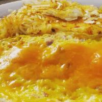 Meat -N- Cheese Omelette,  · Choice of  breakfast meat (sausage, bacon, or ham) and cheese omelette with choice of side, ...