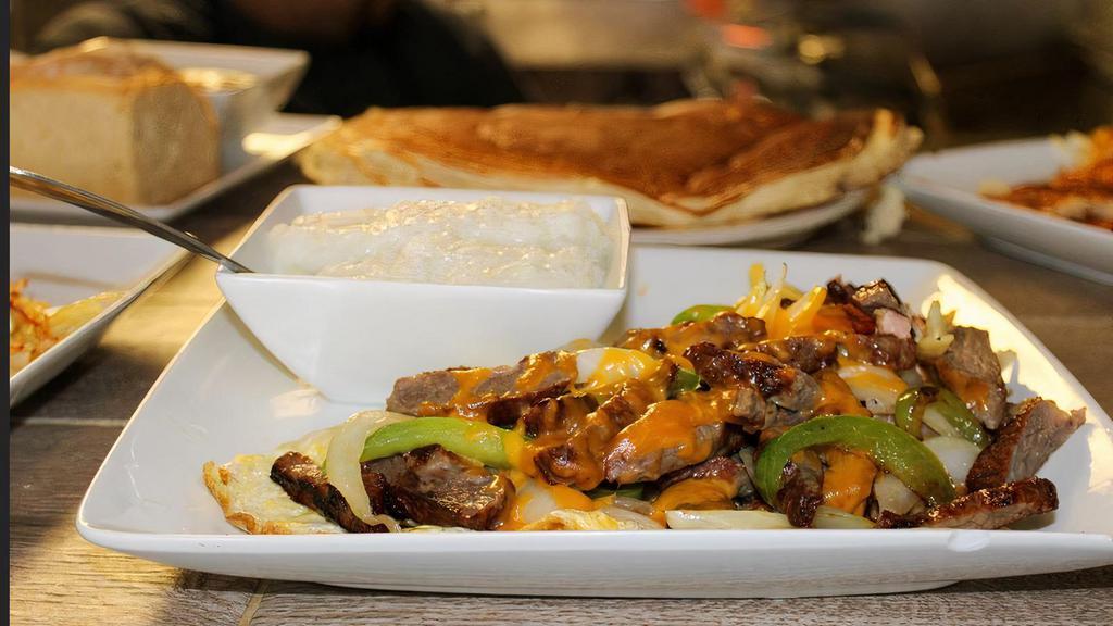 Fajita Omelette · Your choice of chicken or beef fajita, bell peppers, onion, and a side of salsa choice of side, and toast