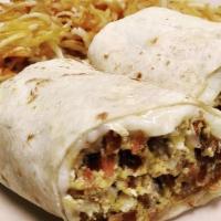 Breakfast Burrito · LARGE FLOUR TORTILLA STUFFED WITH SCRAMBLED EGG, BACON, POTATO, ONION, AND CHEESE. SERVED WI...