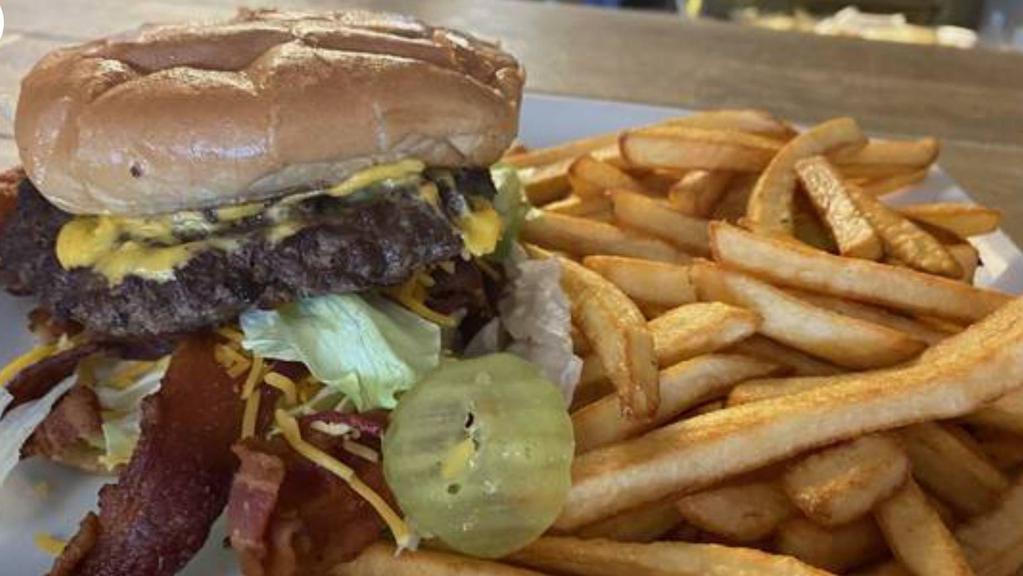 1/2 Pound Build You Own Burger · Build it your way. 

Served with choice of Home fries, hash brown or french fries
