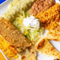 Leslie'S Plate · Half order of chicken quesadillas, one chicken enchilada suiza, one crispy ground beef taco,...