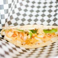 Taco Gobernador · Flour tortilla, grilled shrimp, onion, bell pepper, and cheese.