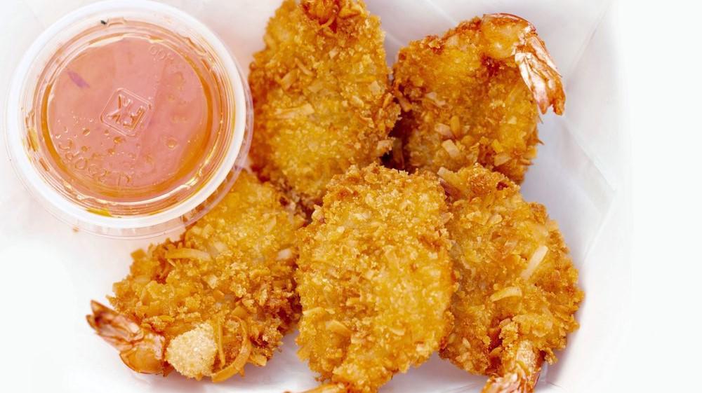 Coconut Shrimp · Six to seven pieces shrimps dipped in batter and rolled in shredded crunchy coconut, deep fried to perfectly golden brown served with sweet and sour sauce.