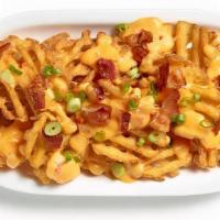 Loaded Waffle Fries · Fresh Crisp Waffle Fries Topped with Melted Cheddar Cheese or Sub our delicious Beer Cheese,...