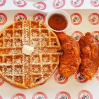 Waffles & Chicken · 8 inch waffle with a scoop of butter and a side of maple syrup and 2 pcs of chicken tenders