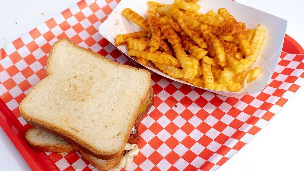 Tex-Ville Sandwich · A well-seasoned fried breast chicken fillet slathered with a special sauce, finished off with coleslaw, and put inside our own Texas toast is what dreams are made of.
ORDER COMES WITH A SIDE OF FRIES