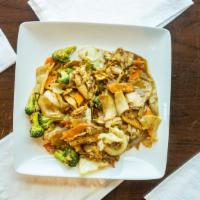 Pad See Ewe  · Stir-fried flat noodles with egg, broccoli, cabbages, carrots, green onions, and garlic