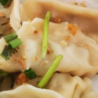 Steamed Dumplings · served with dumpling sauce