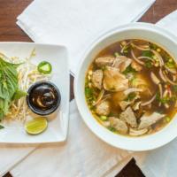 Pho Beef Soup · Special delicacy beef noodle soup,wdw meat ball, red and green. onions, cilantro, fried garl...