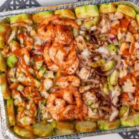 La Marisquera / The Seafood Tray · aguchile verde, camarones,aguachile rojo, ceviche de pescado.

green aguachile, shrimps, red...