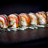 Yami Rolls (8 Pieces) · Spicy salmon, cream cheese, jalapeño, soy paper deep fried, topped with avocado, eel sauce, ...