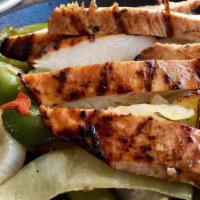 Chicken Fajitas For 2 · Marinated chicken fajita with sautéed onions and bell peppers.