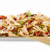 Ultimate Nachos · house-made tortilla chips / Hatch queso / cheddar-jack cheese blend / house-made pico de gal...