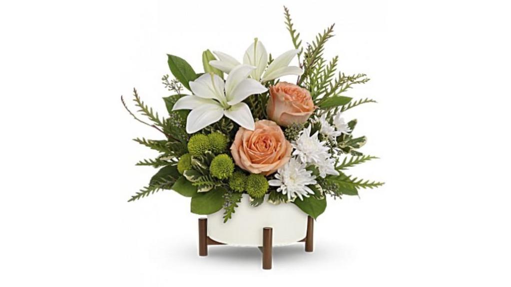Mod Bloom · Unique in every way, this striking bouquet of peach roses and white lilies is artfully presented in a mid-mod ceramic planter with sculptural wood base.