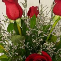 Rosy Posy · Half dozen roses in vase any color  with filler