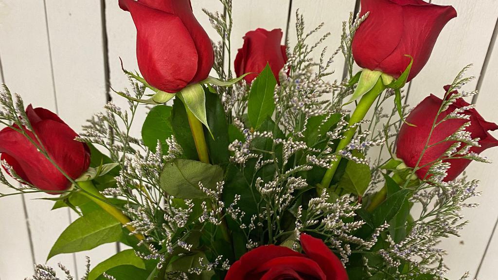 Rosy Posy · Half dozen roses in vase any color  with filler