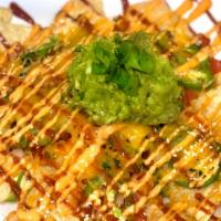 Mini Nachos · Tortilla chips topped with kimchi, pico de gallo, Jalapeños, melted shredded Cheddar & Monte...
