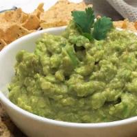 Chip With Guac · Deep-fried tortillas with homemade guacamole.