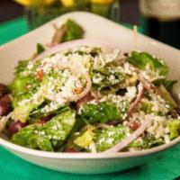 Greek Salad · Lettuce, tomatoes, cucumbers, bell peppers, red onions, Feta cheese, and olives, topped with...