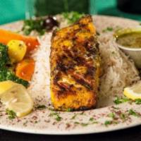 Grilled Salmon · Grilled salmon fillet topped with SanabelS sauce.