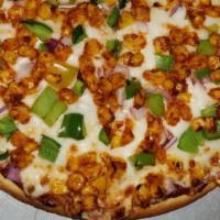 Spicy Corn Pizza · Spicy Marinated Corn, Spicy Sauce, Bell Pepper, Red Onion & Cheese.
