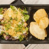 Papri Chaat  · Papdi chips with potato, garbanzo beans, onion, topped with tamarind and spicy chutney’s, ho...