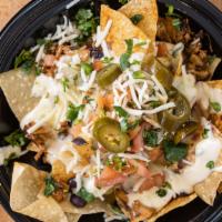 Nachos · Queso included in price