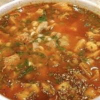 Menudo · With onions, lemon, and two tortillas.